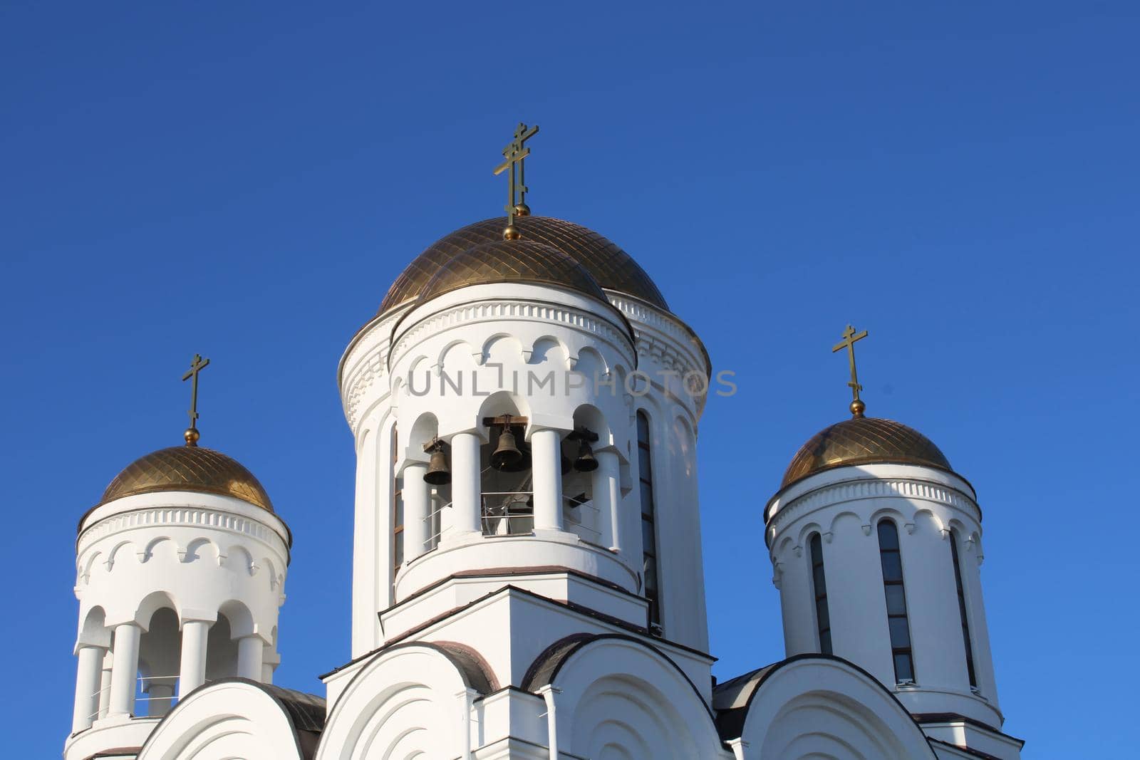 The church is made of white stone. Religion. Orthodoxy. Architecture. High quality photo