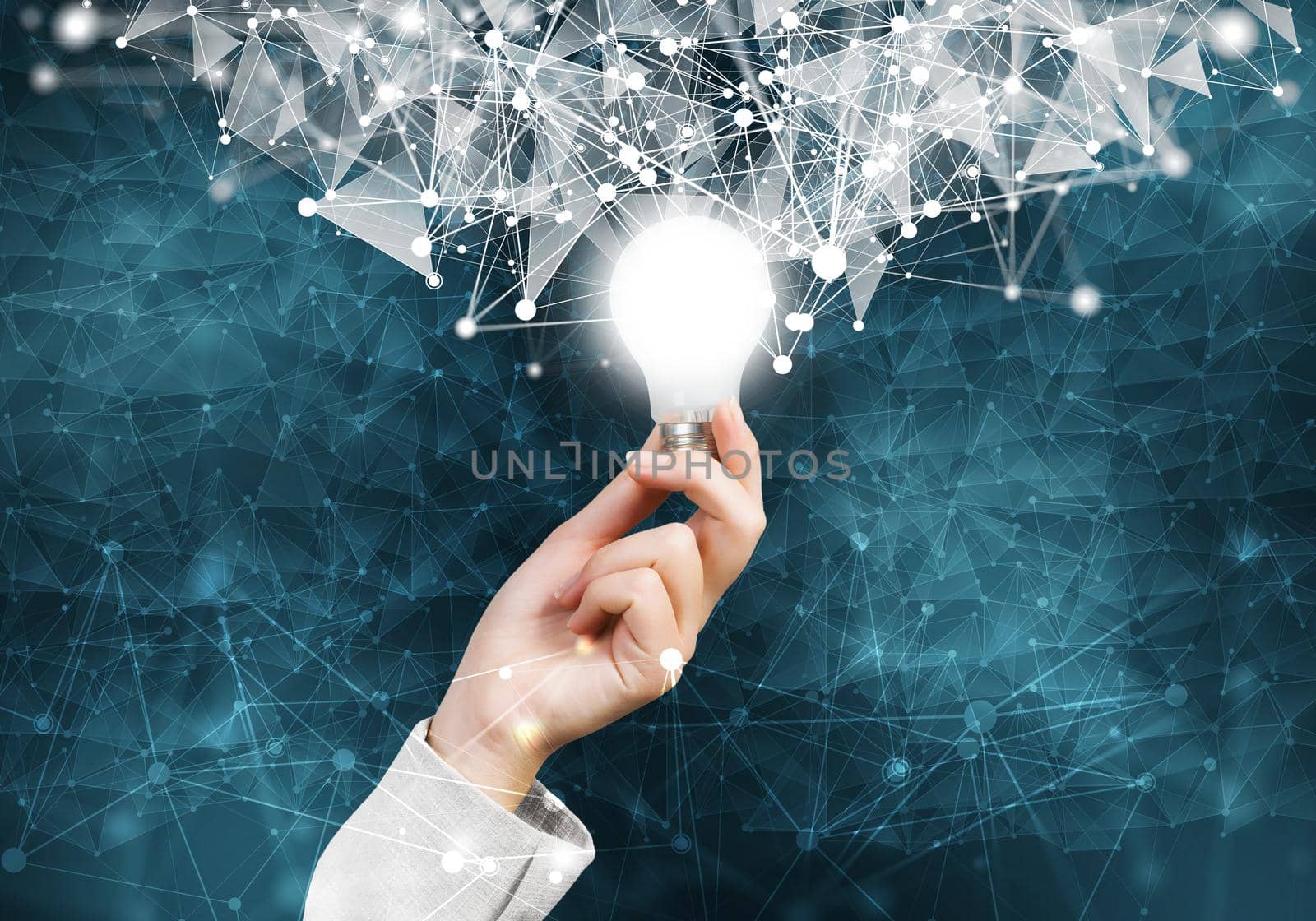 Human hand with glowing lamp and abstract network composition on dark wall background. Science research and innovation. Internet marketing and business development. Mixed media with 3d virtual network