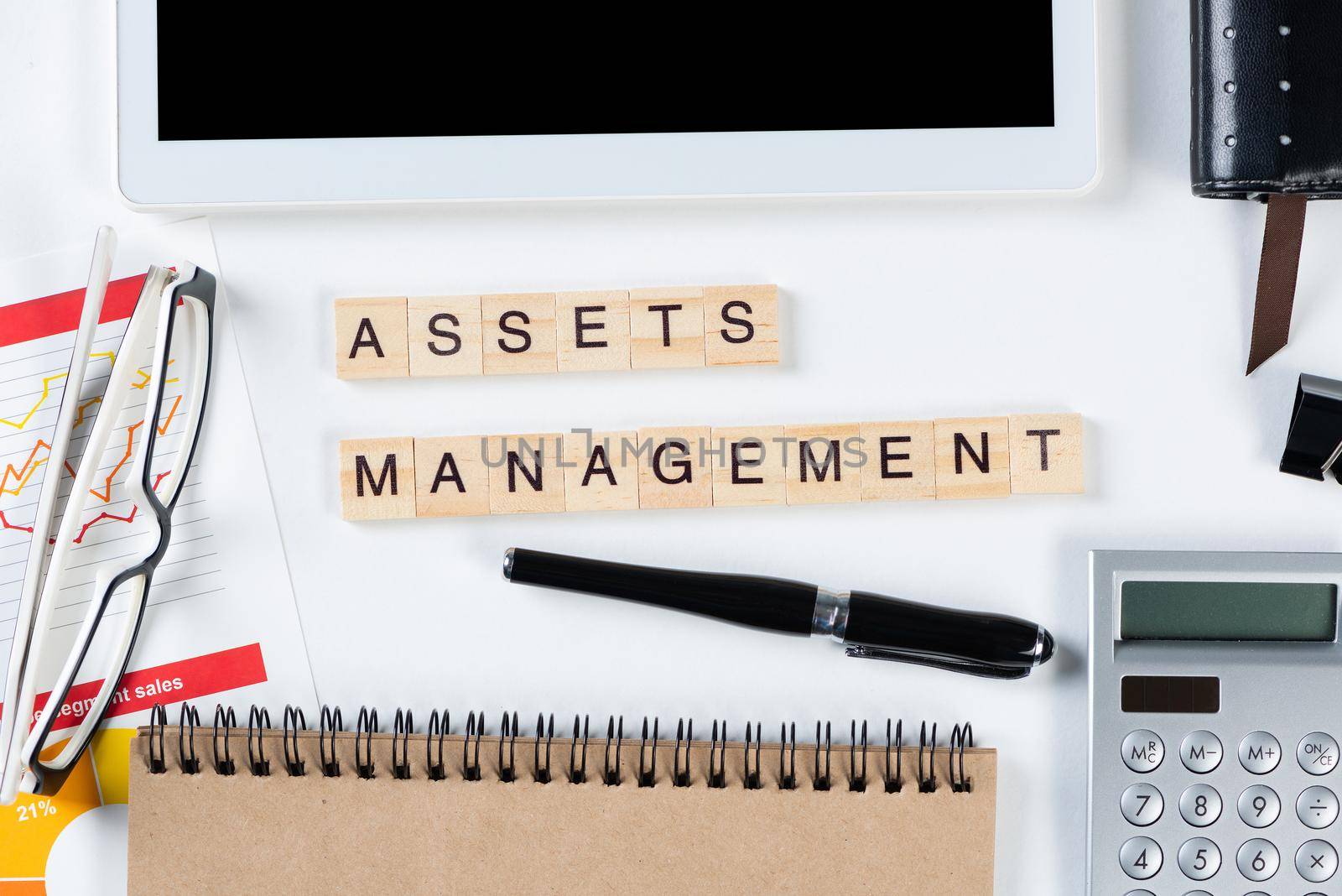 Asset management concept with letters on cubes by adam121