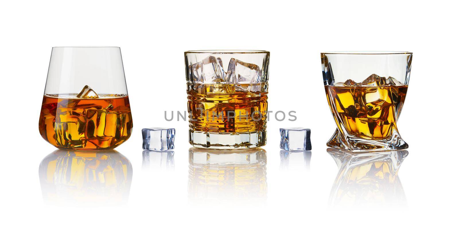 set of whiskey glasses. Collage glasses of whiskey on white background. by PhotoTime