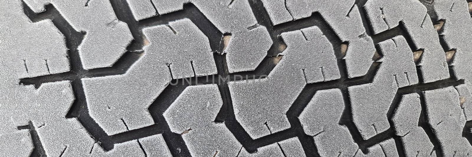 Winter tires on car wheel with frost closeup by kuprevich