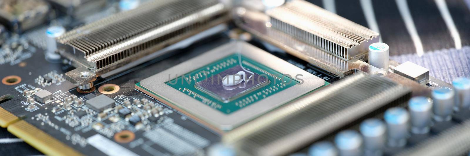 Cpu microchip processor with thermal paste closeup by kuprevich