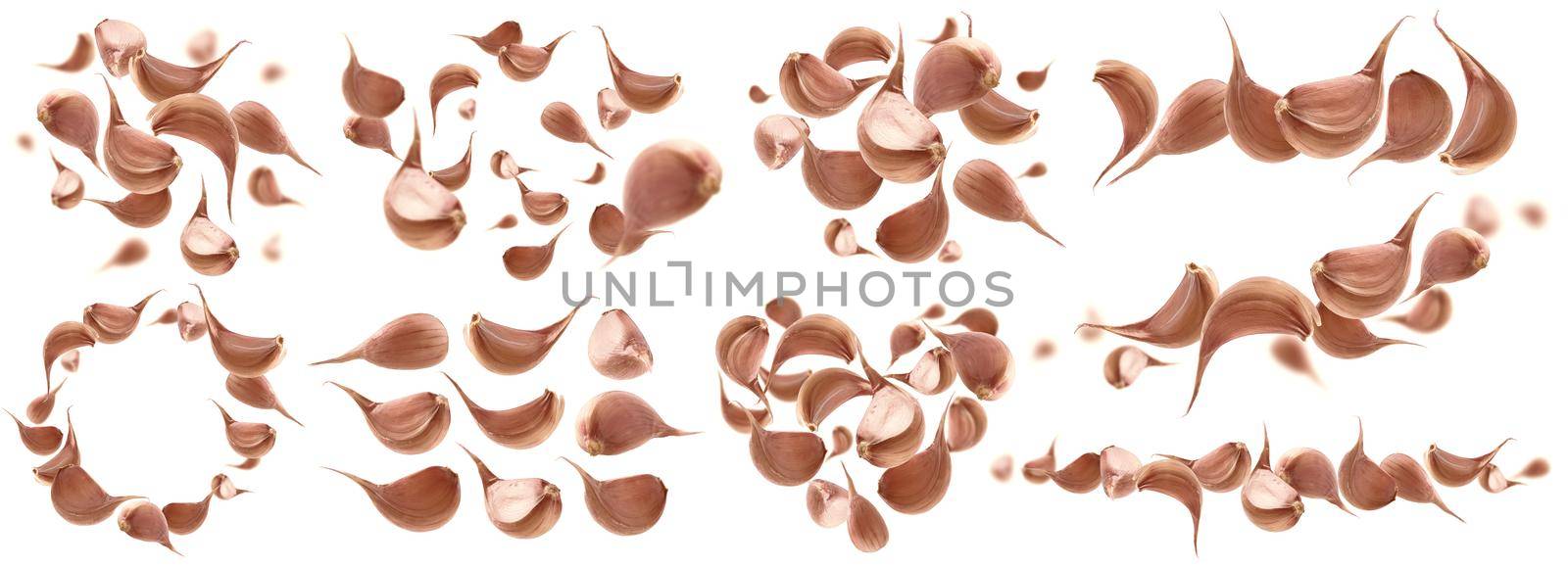 A set of photos. Garlic cloves levitate on a white background.