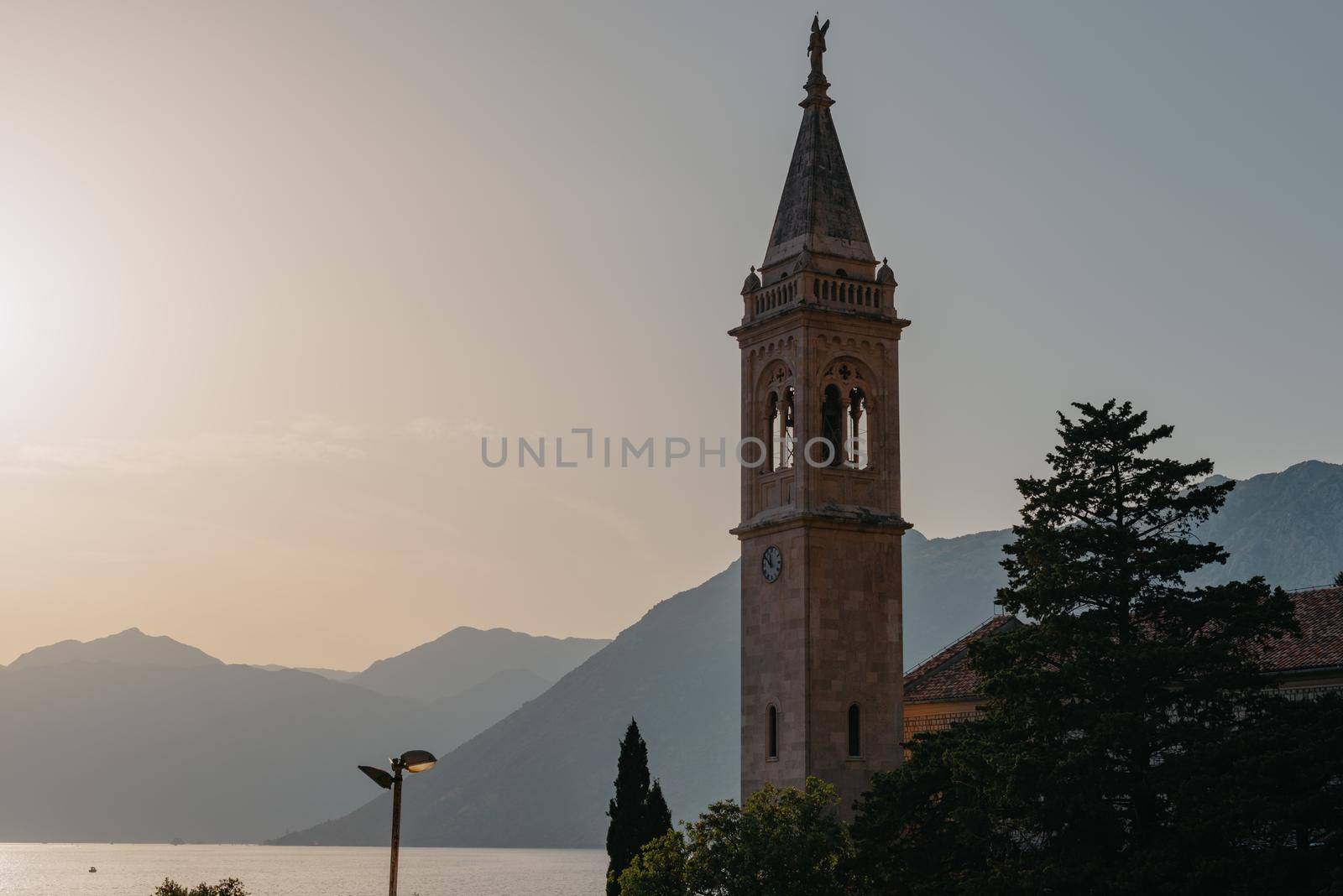 Beautiful view of the coast of Kotor Bay and St.Eustace's Church in the village Dobrota in Montenegro. Church of St. Eustachius is located in Dobrota , Kotor Montenegro