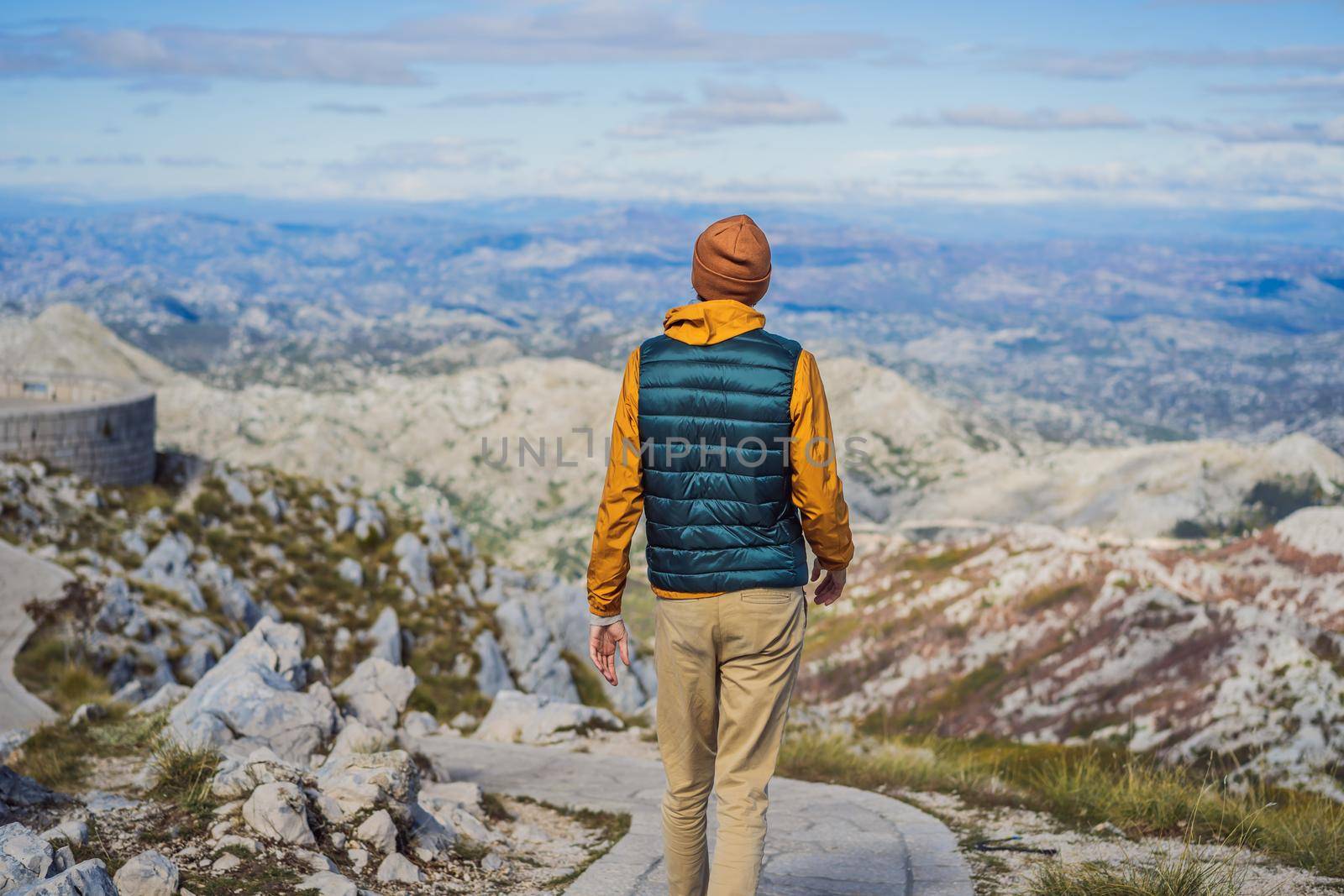 Man traveller in mountain landscape at national park Lovcen, Montenegro. Travel to Montenegro concept by galitskaya