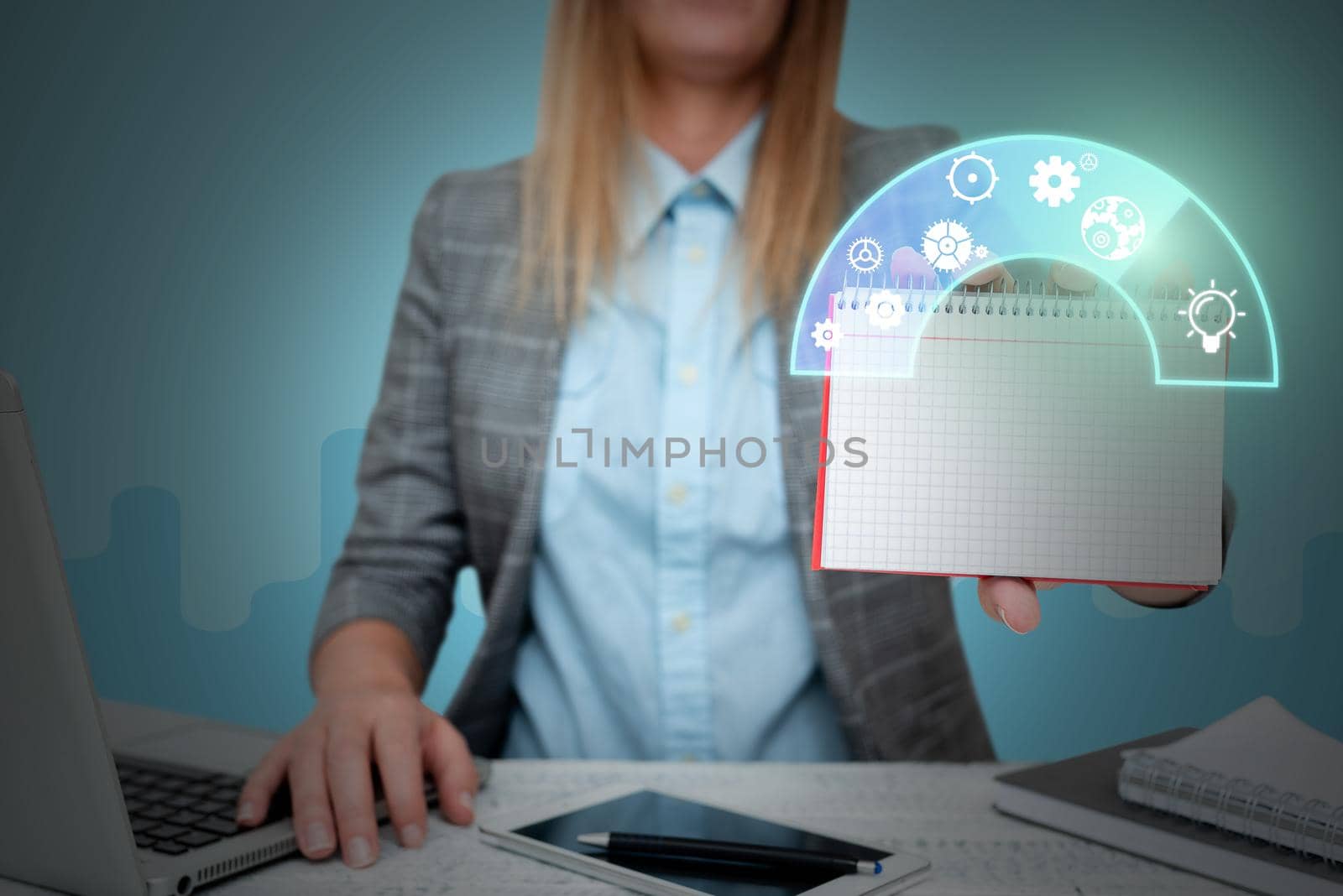 Lady in suit holding notepad representing innovative thinking.