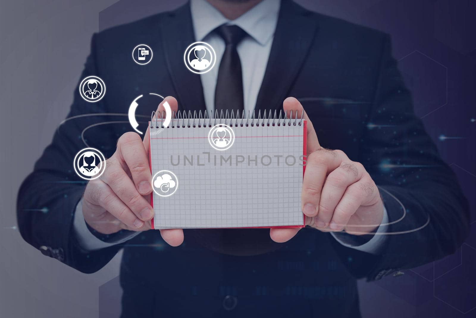 Businessman in suit holding notepad symbolizing successful teamwork.