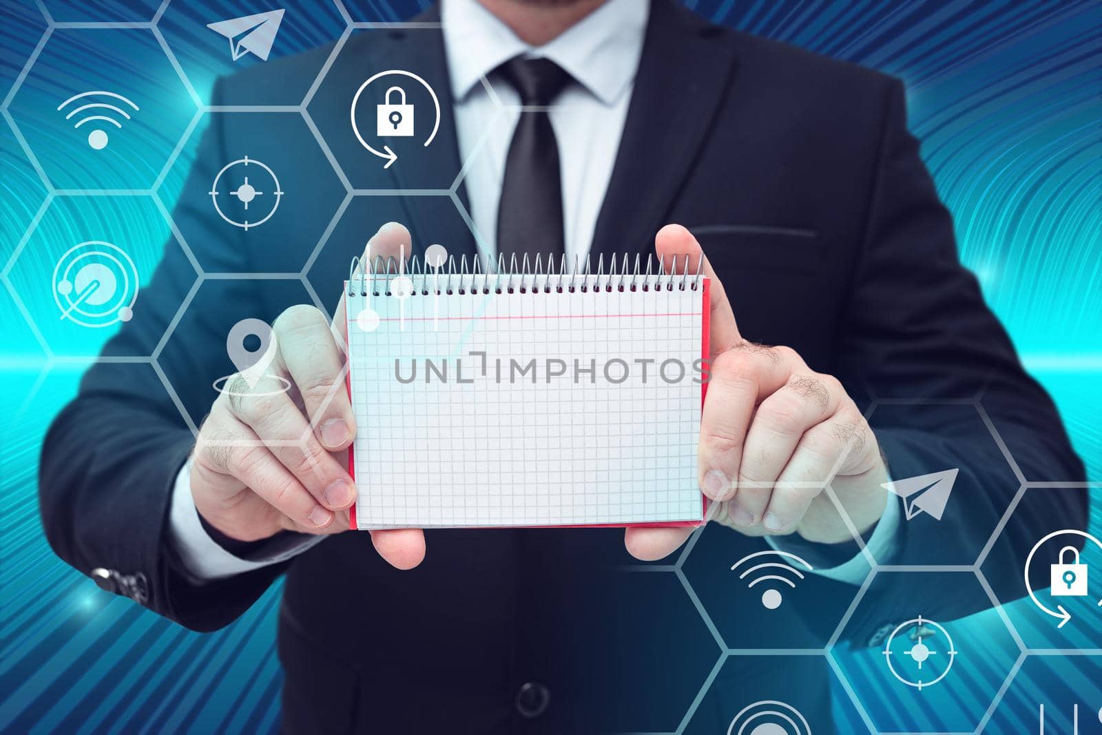 Businessman in suit holding notepad symbolizing successful teamwork.