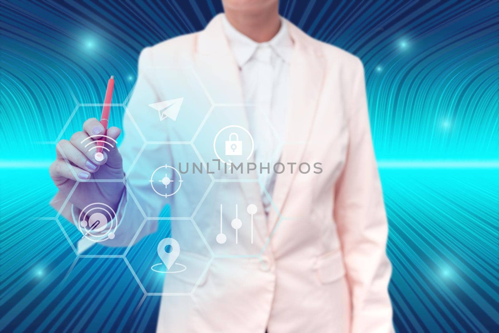 Lady in suit holding pen symbolizing successful teamwork accomplishments.