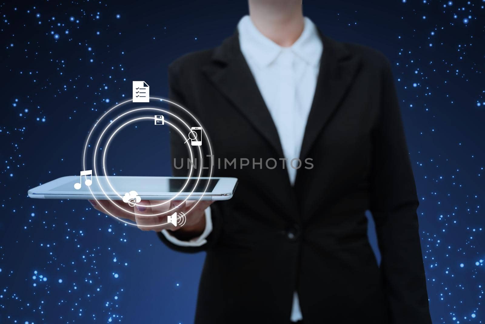 Lady in suit holding electrical tablet presenting innovative thinking.