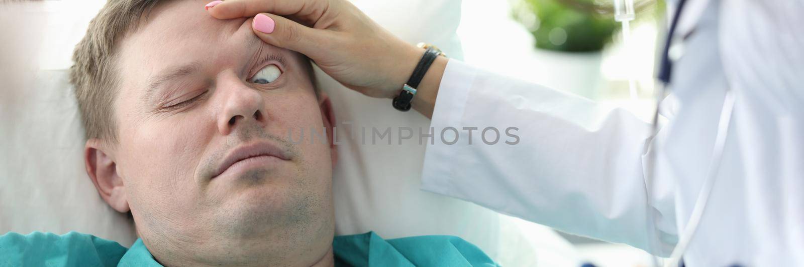 Doctor opens his eyes to patient unconscious clinic by kuprevich