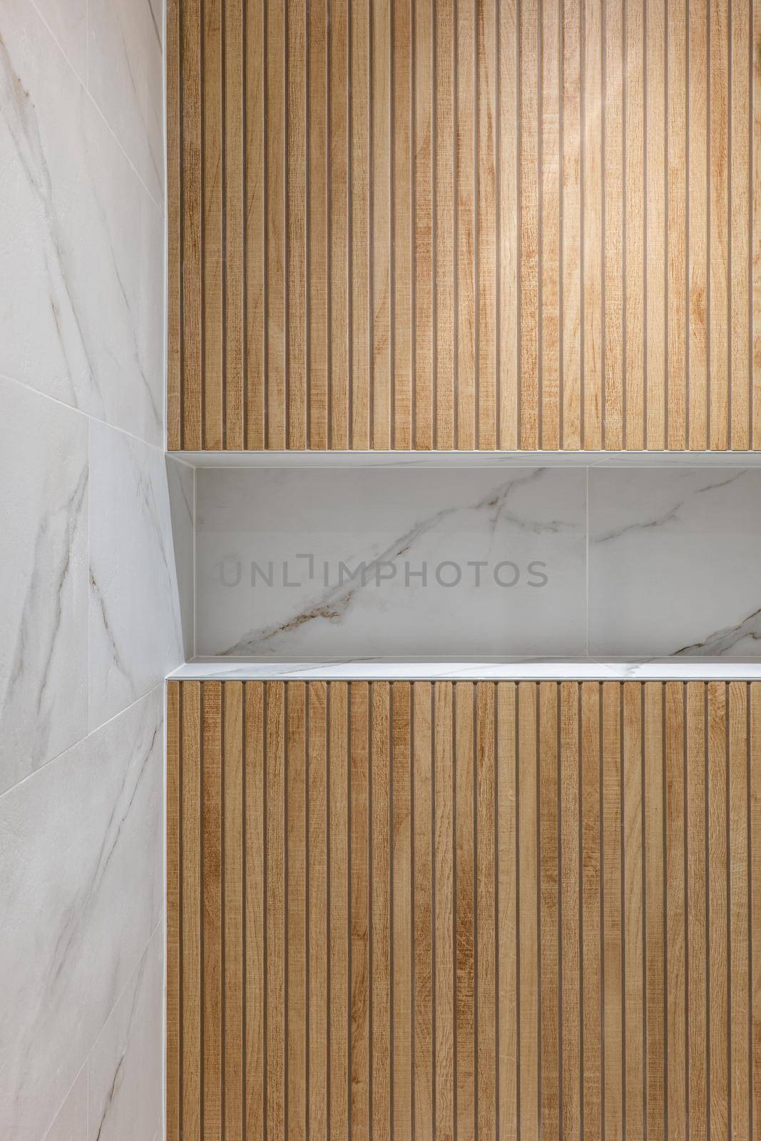 Wooden finishing in shower zone of modern refurbished bathroom