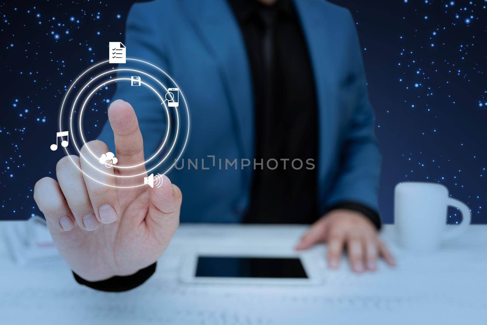 Businessman in suit pointing upwards representing innovative thinking.