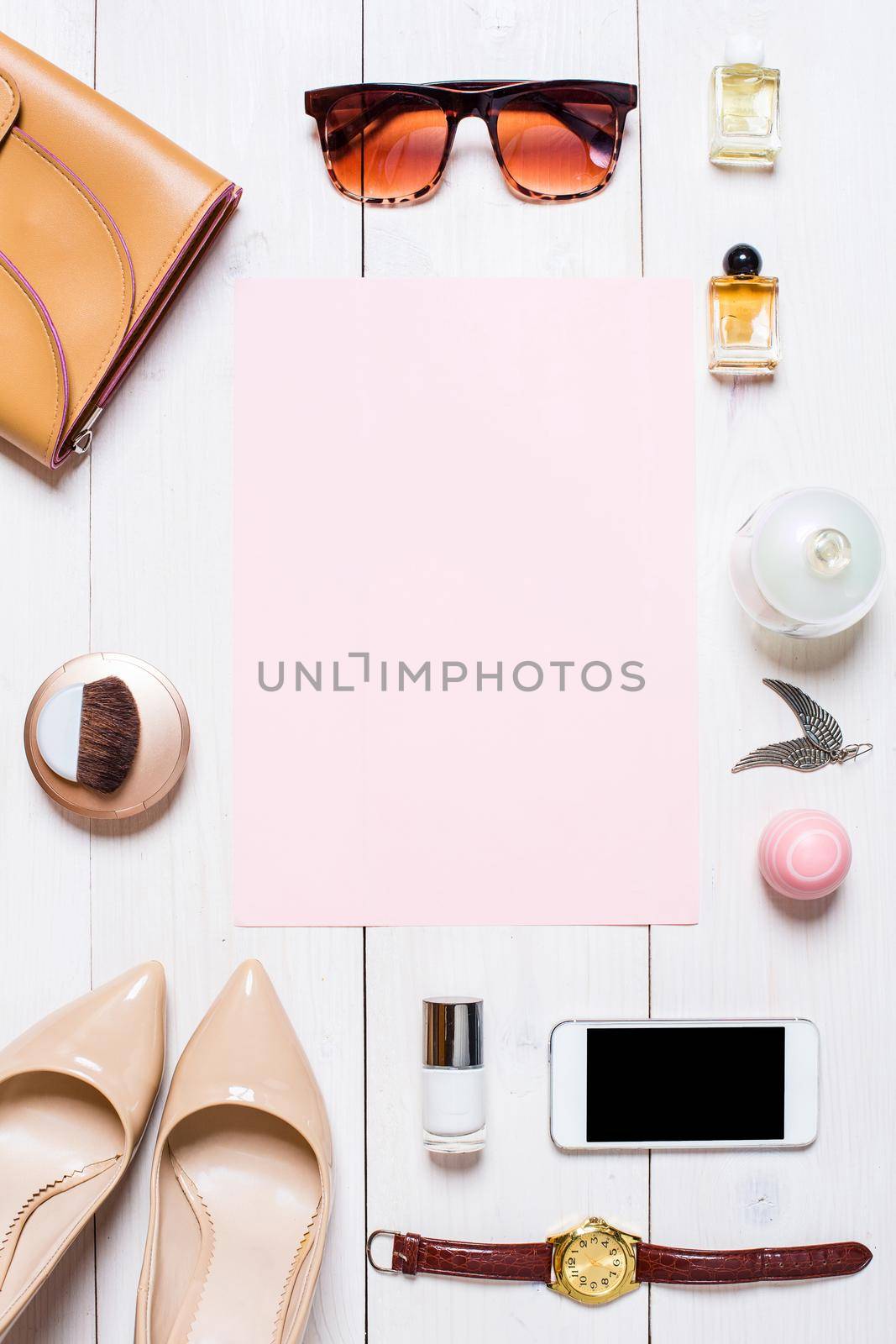 Flat lay, top view, mock up women's clothes and accessories on a white background. phone, shoes, perfume, sunglasses