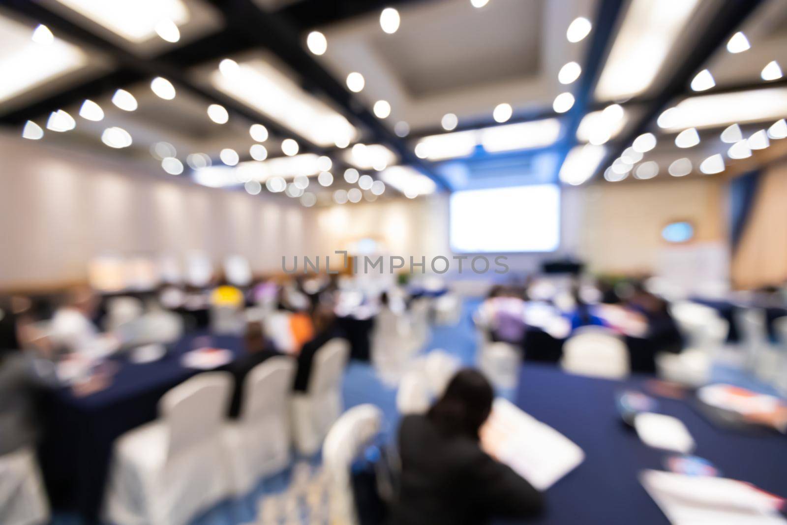 Abstract blur group of people in business training workshop, professional corporate seminar meeting