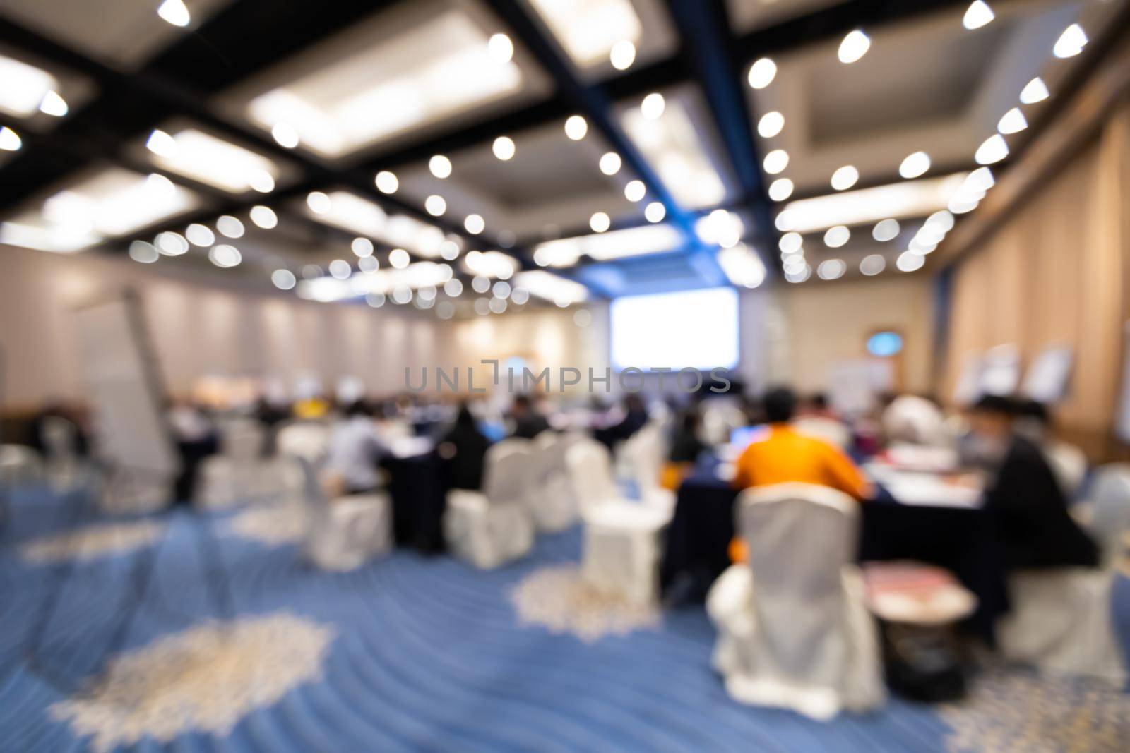 Abstract blur group of people in business training workshop, professional corporate seminar meeting