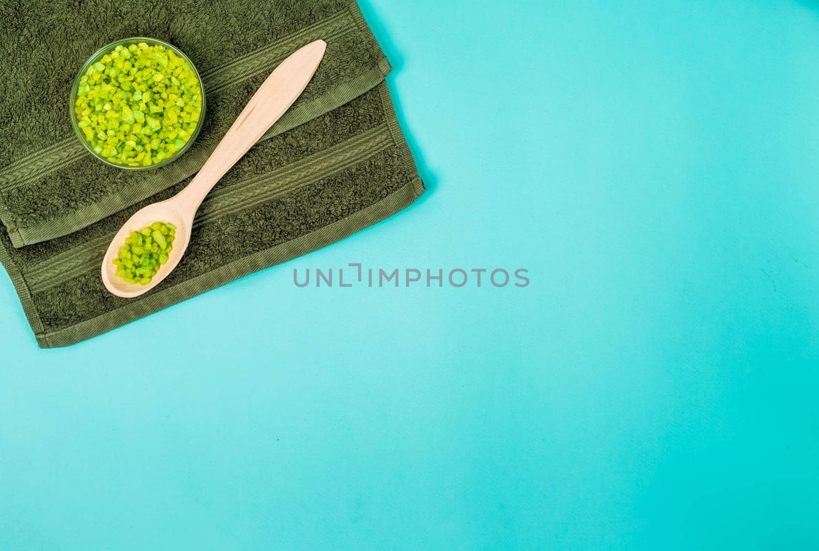 Spa set: oil, sea salt and towel. Top view. Still life. Copy space