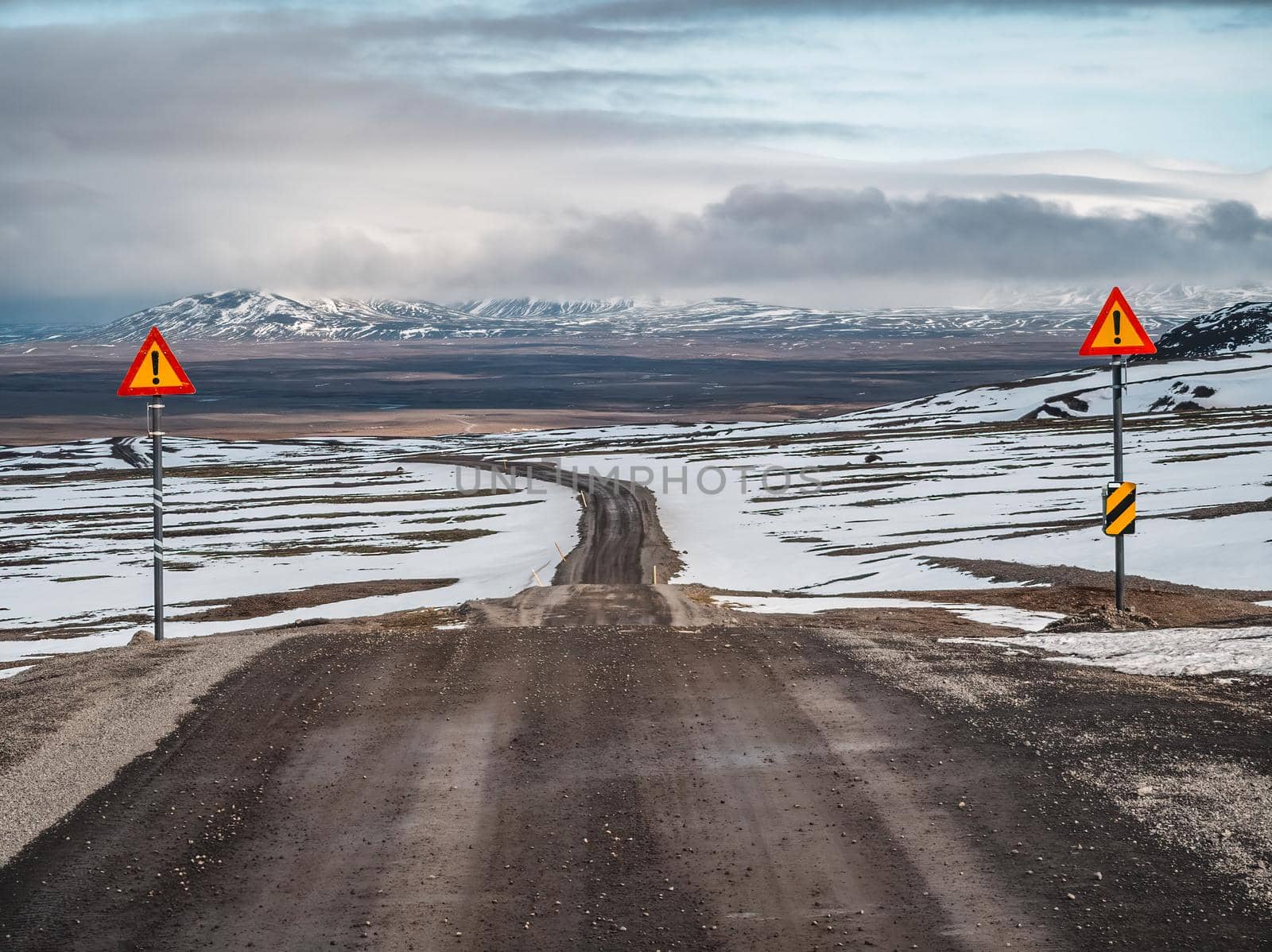 Remote road to highlands with danger signals in Iceland