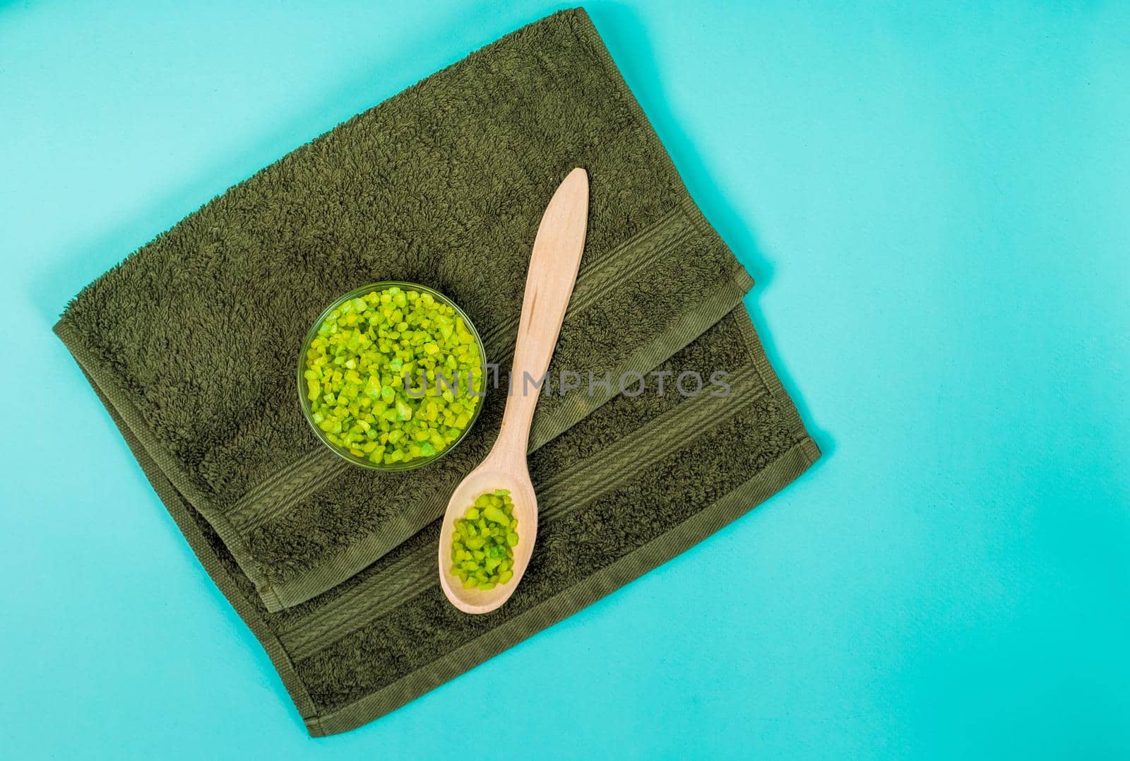 Spa set: oil, sea salt and towel. Top view. Still life. Copy space