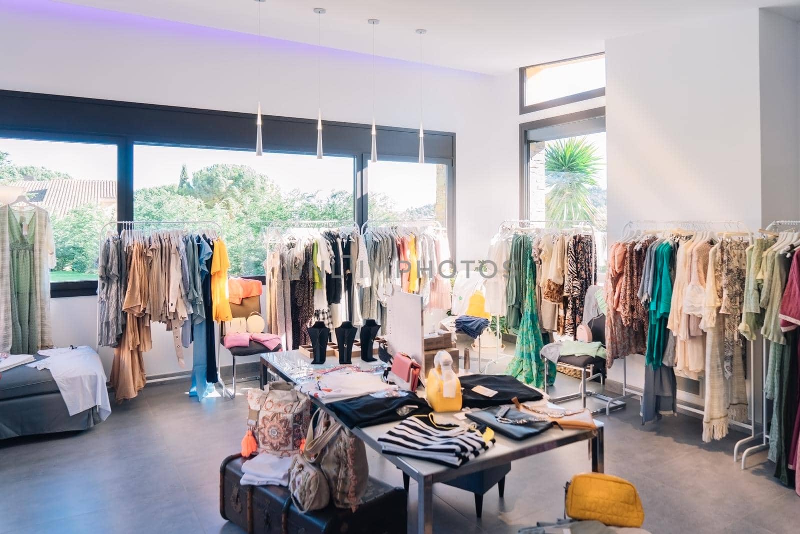 small clothing sales business. clothing showroom. Shopping concept by CatPhotography