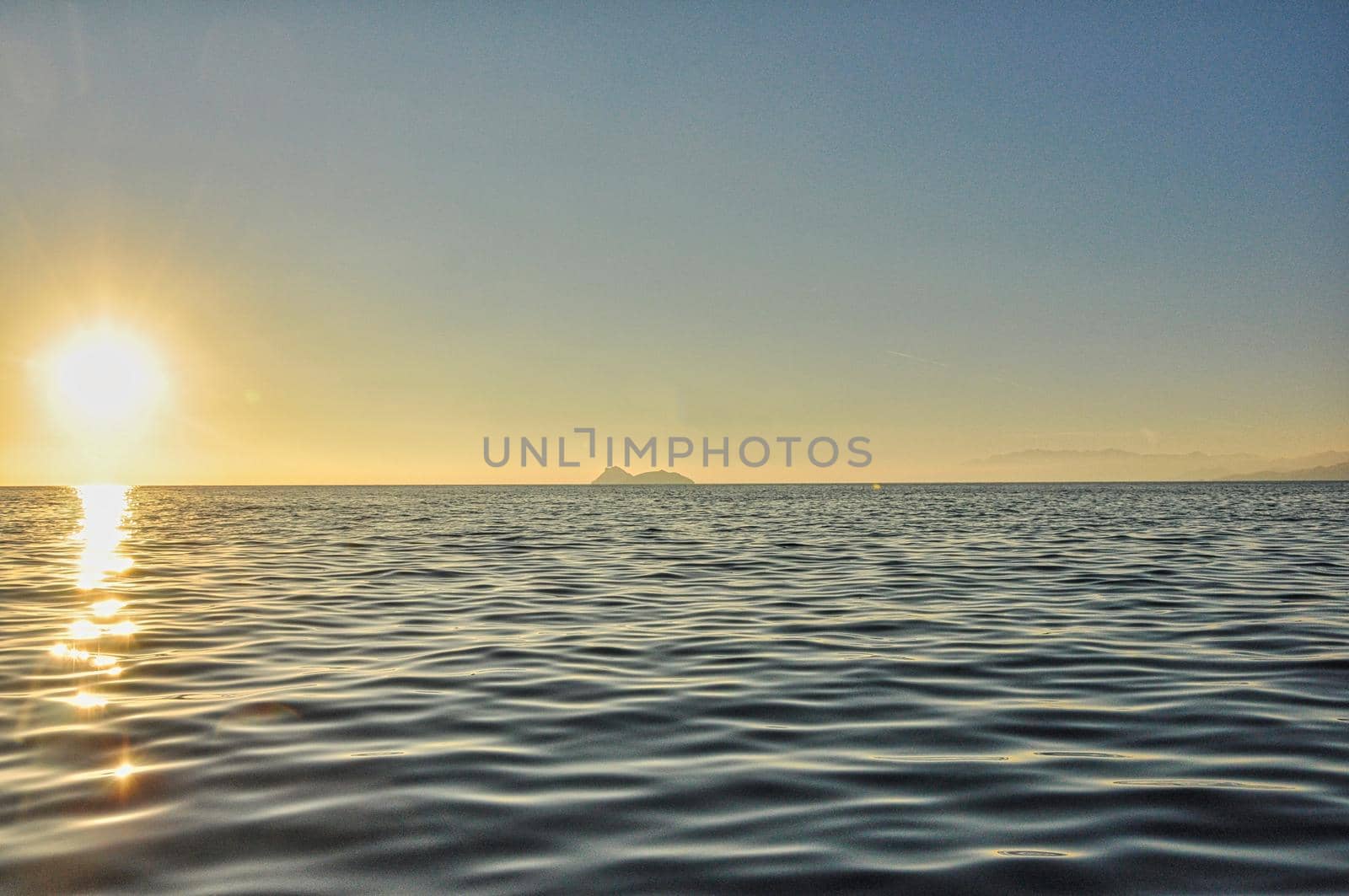 Sunset from the sea of Matala city