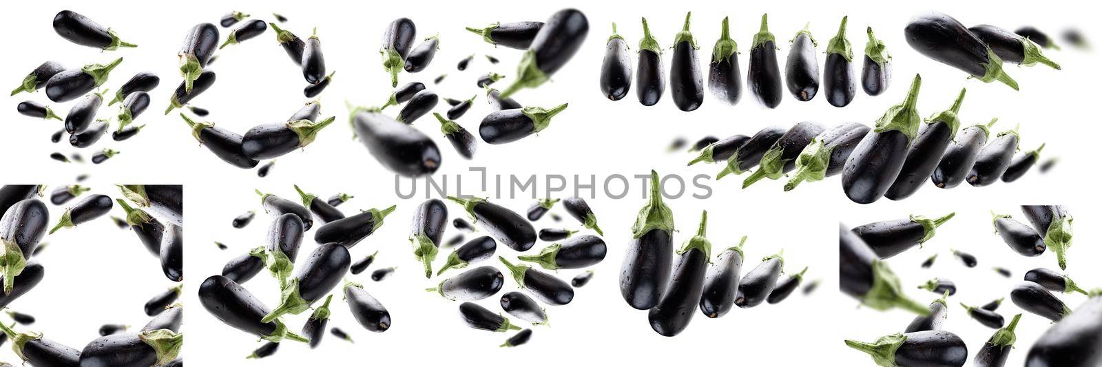 A set of photos. Ripe eggplants levitate on a white background.