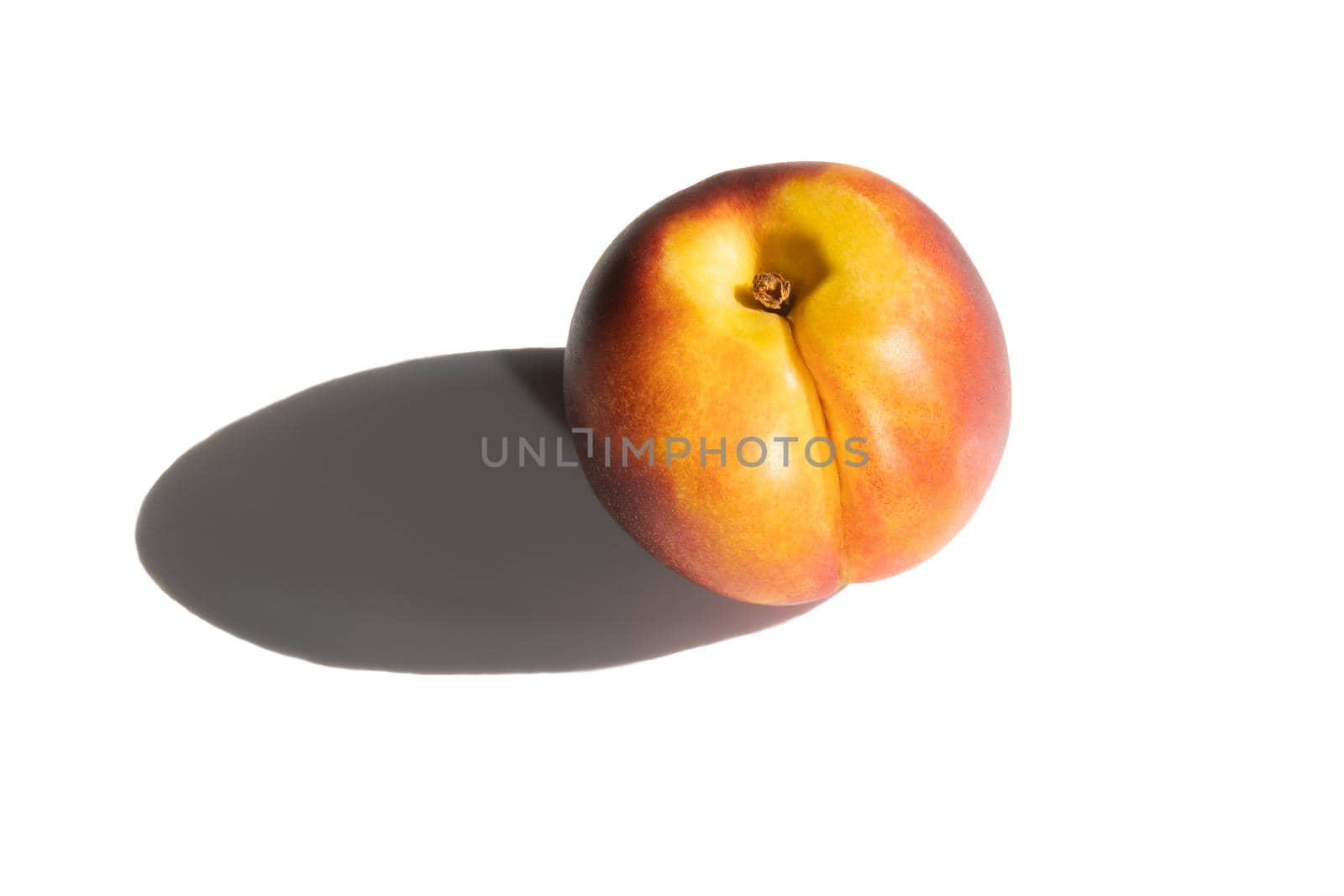 peach with shadow on white background, tasty food