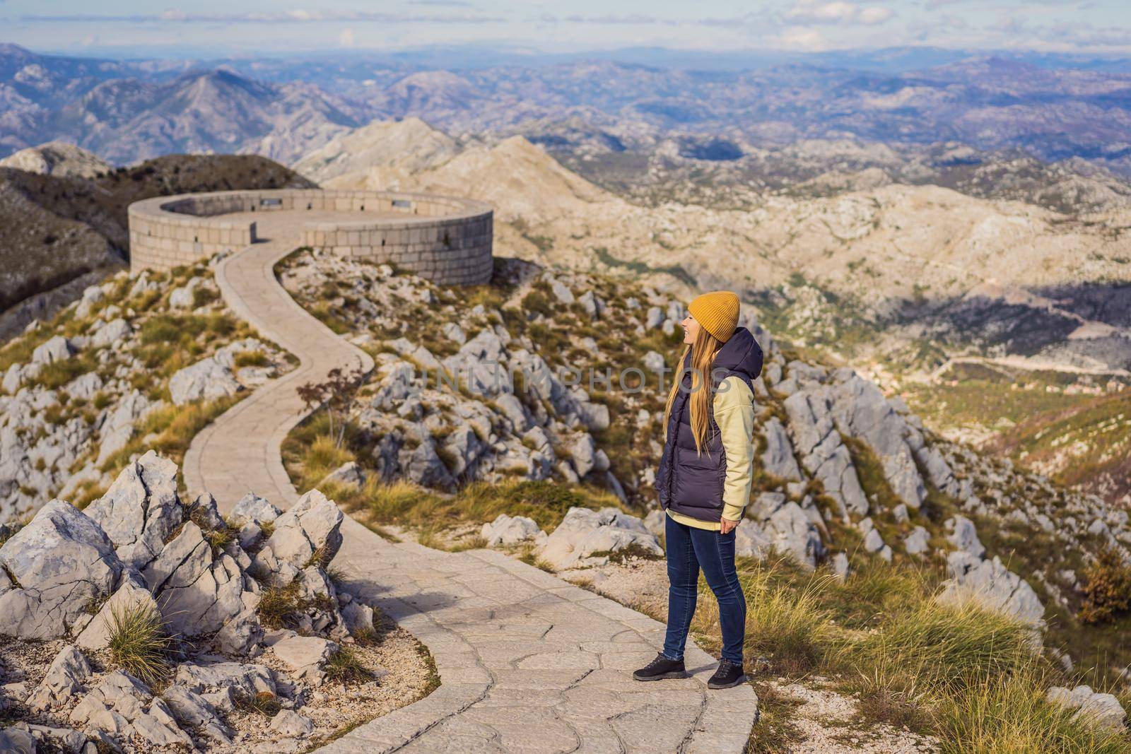 Woman traveller in mountain landscape at national park Lovcen, Montenegro. Travel to Montenegro concept by galitskaya