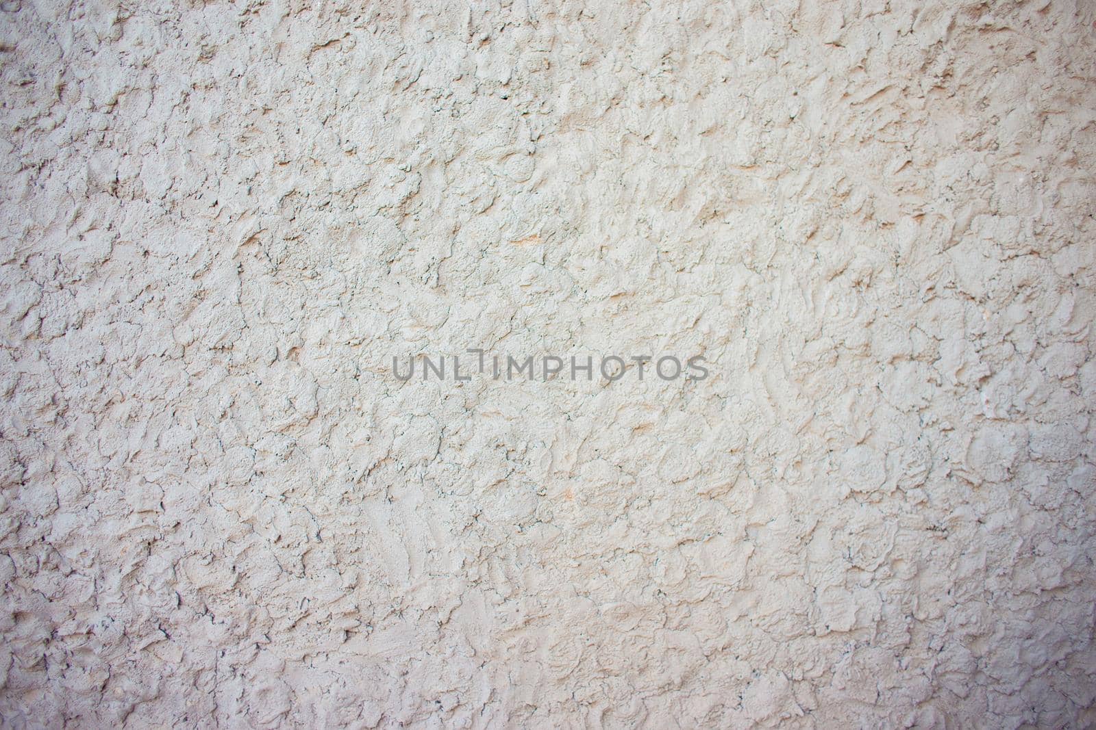 Abstract background of chaotically plastered cement on the wall. Cement pattern. Cement stucco molding on the walls of the building