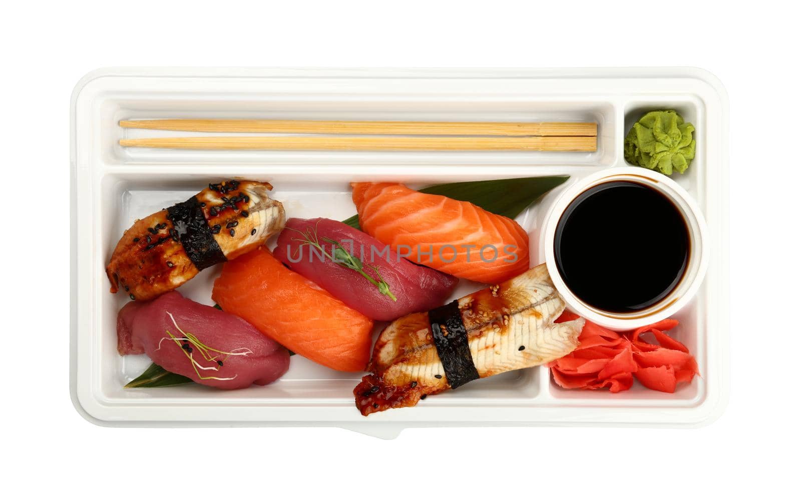 Close up take away set of nigiri sushi with eel, raw salmon and tuna fish in disposable plastic tray isolated on white background, elevated top view, directly above