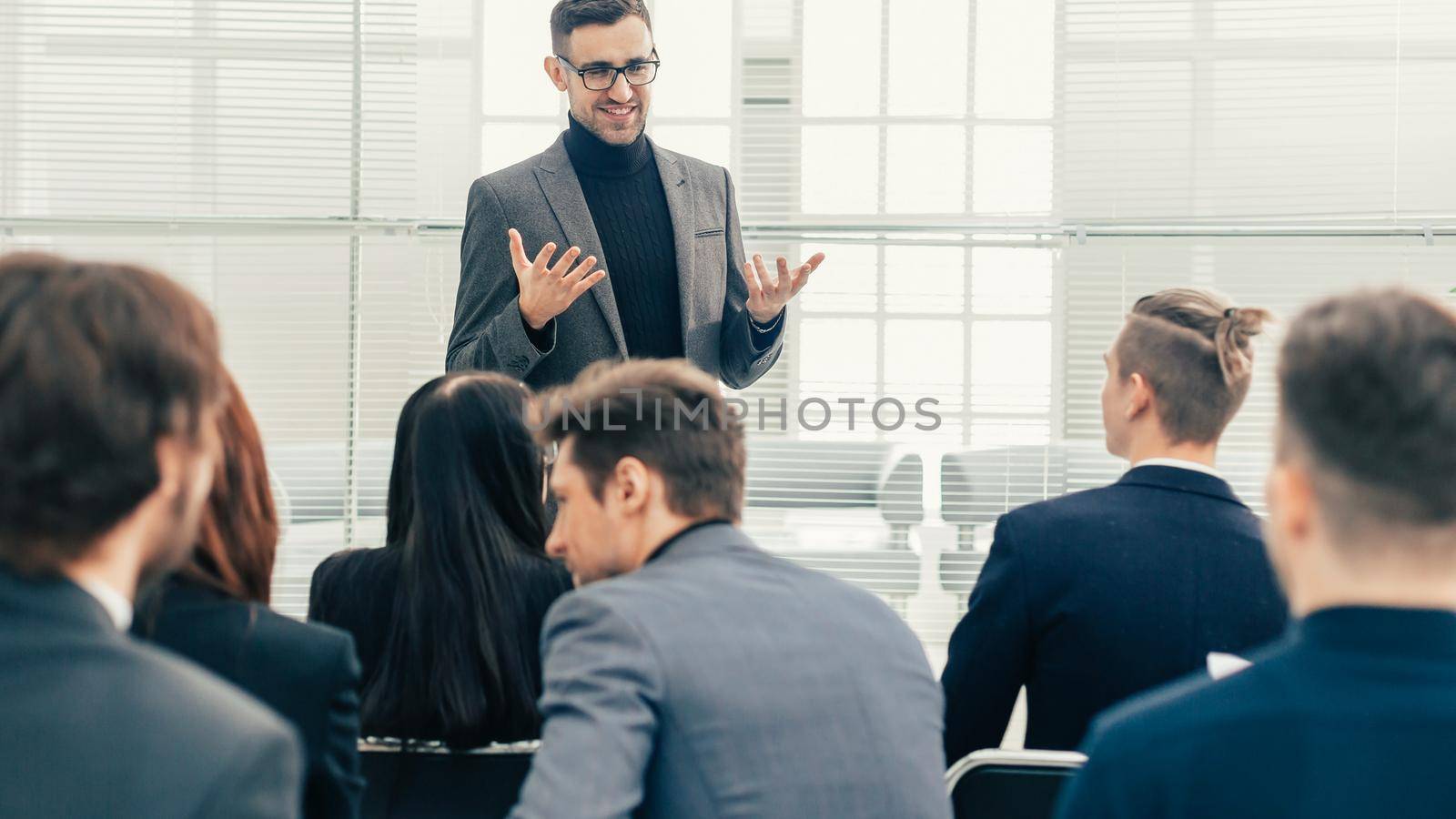 project Manager at a working meeting with the business team. by SmartPhotoLab