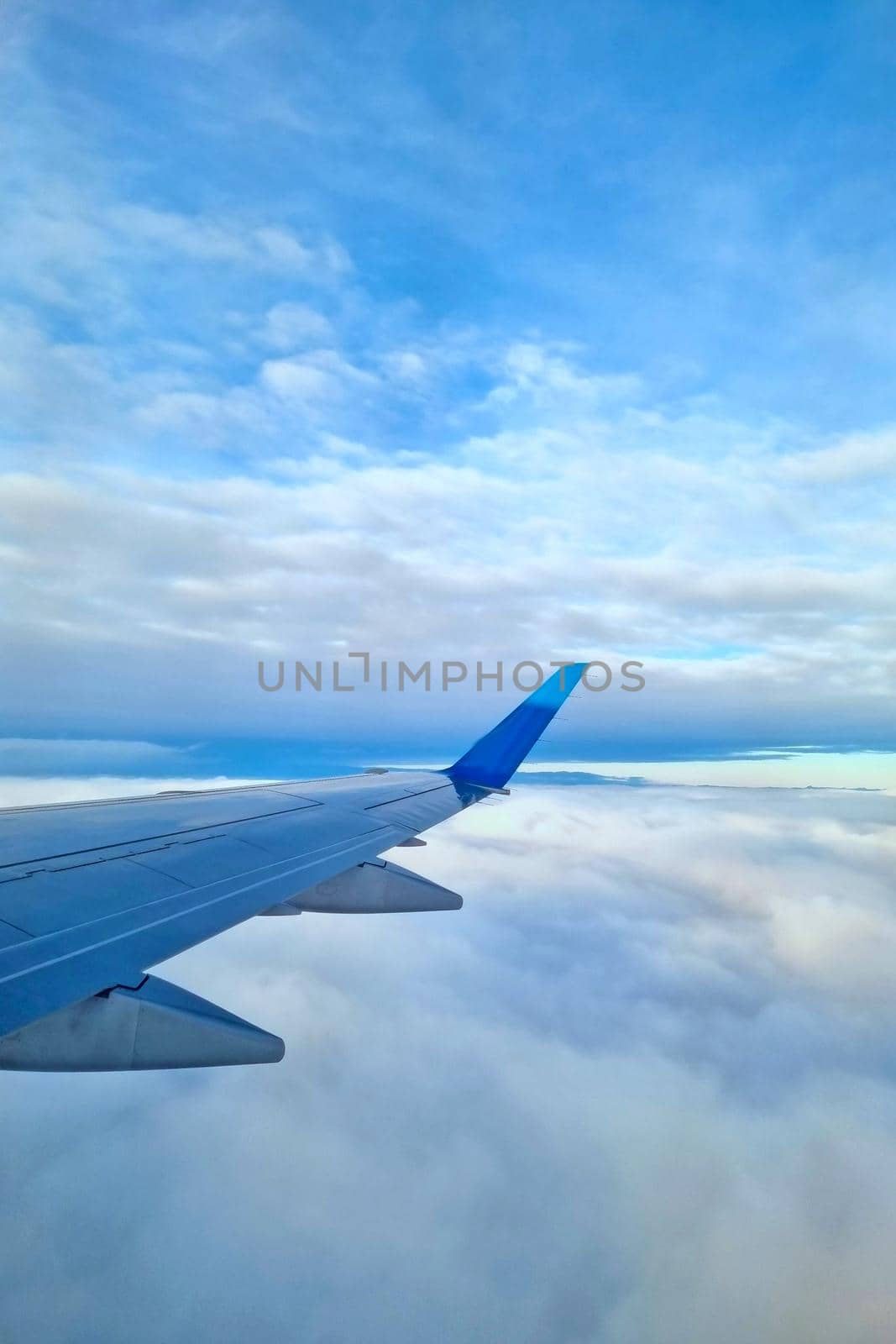 A picturesque view from a flying plane to the clouds. by kip02kas