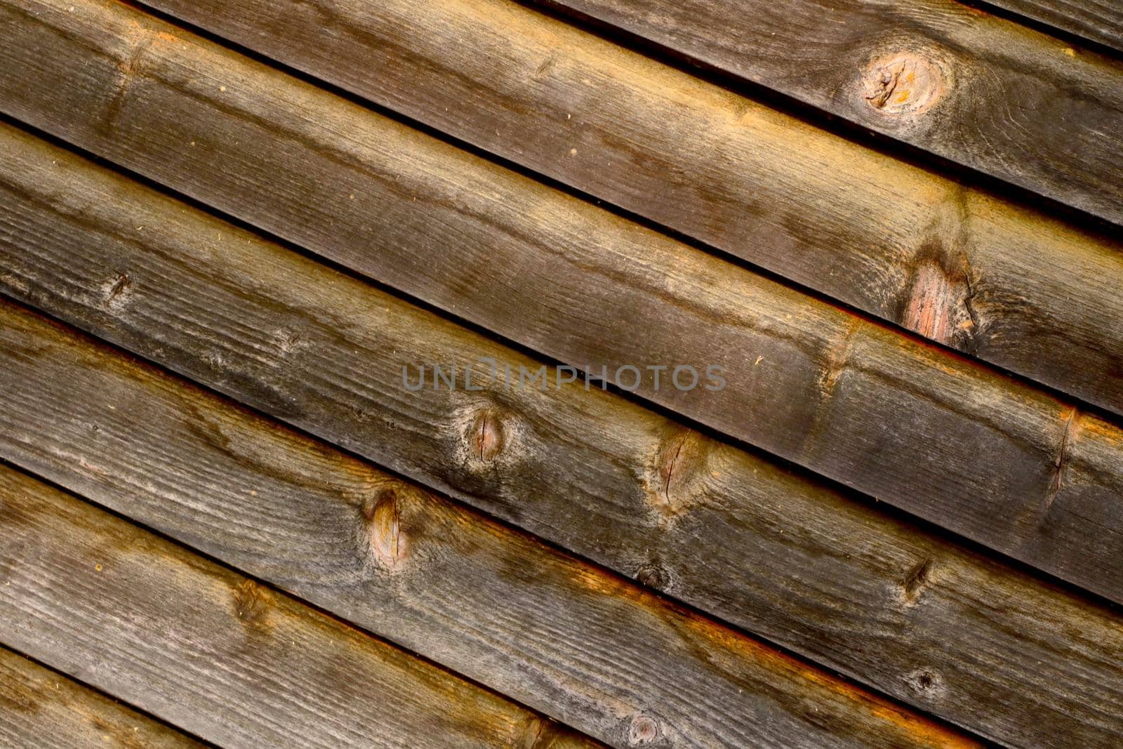 Beautiful wooden texture of the fence or wall of the house, background. by kip02kas