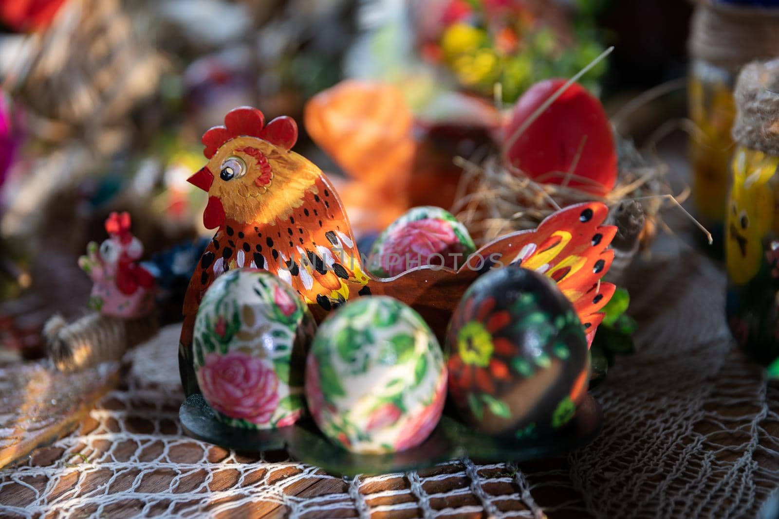 Handmade hen and Easter eggs by an artist as an Easter decoration.
