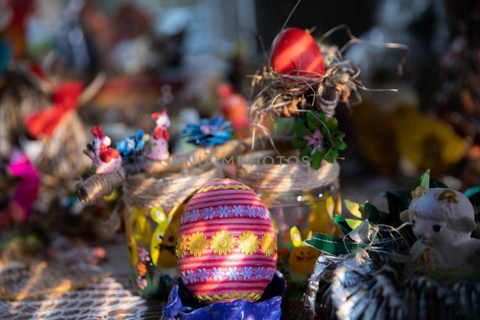 Hand decorated Easter egg with colorful floral patterns. Polish folk design.