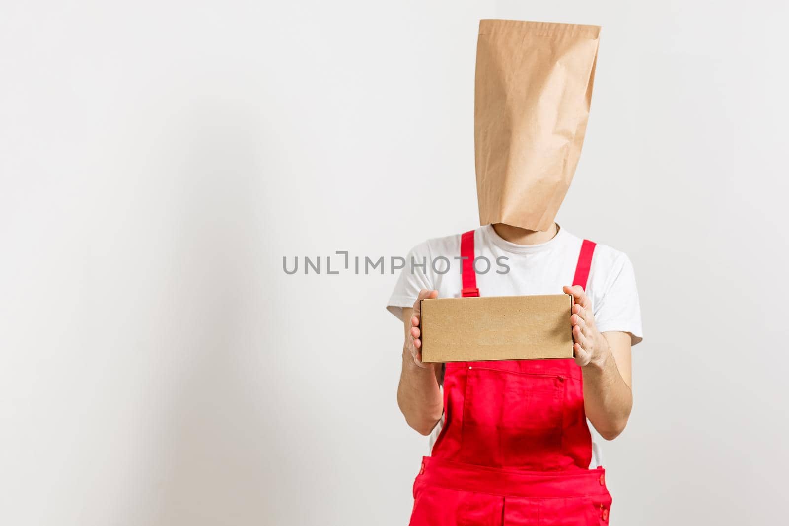 delivery service, fast food and people concept - happy man with coffee and disposable paper bag