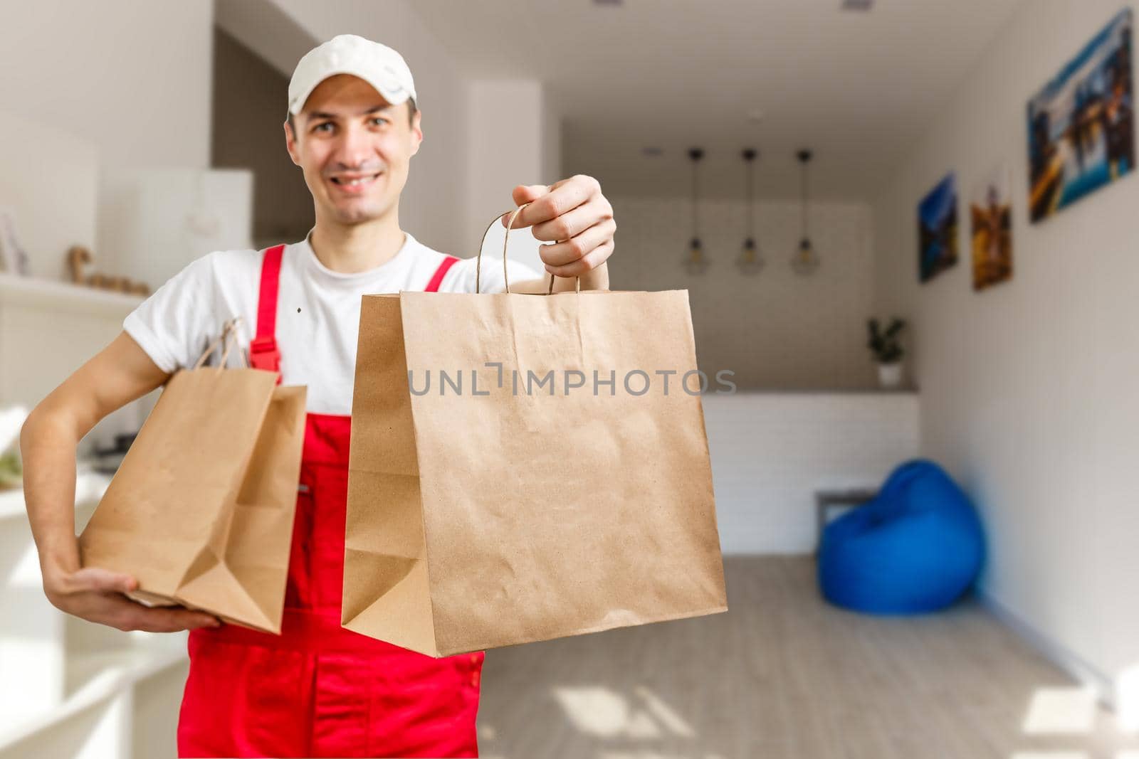man with food delivery packages.