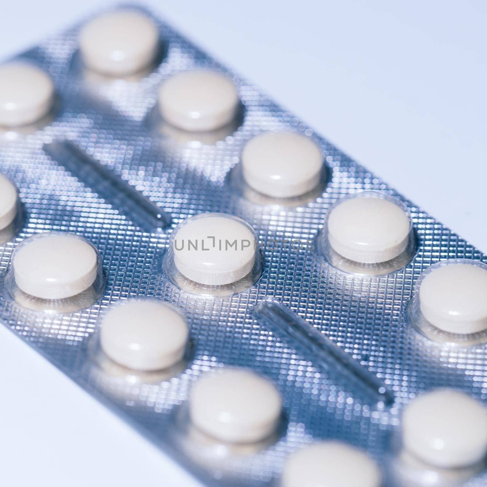 close up. package of tablets on a white background. photo with a copy-space.