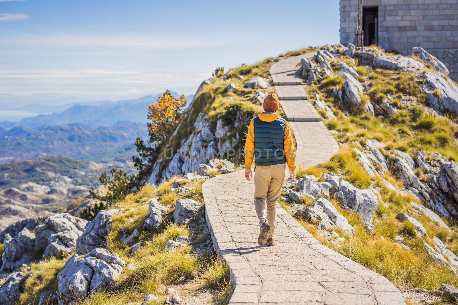 Man traveller in mountain landscape at national park Lovcen, Montenegro. Travel to Montenegro concept by galitskaya