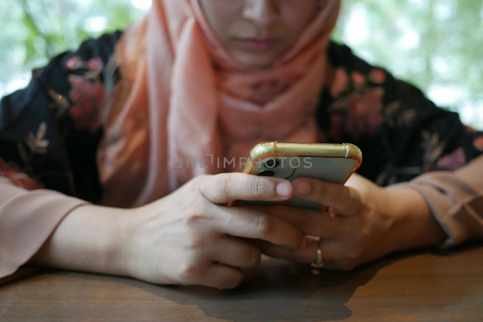 close up of women hand holding smart phone.