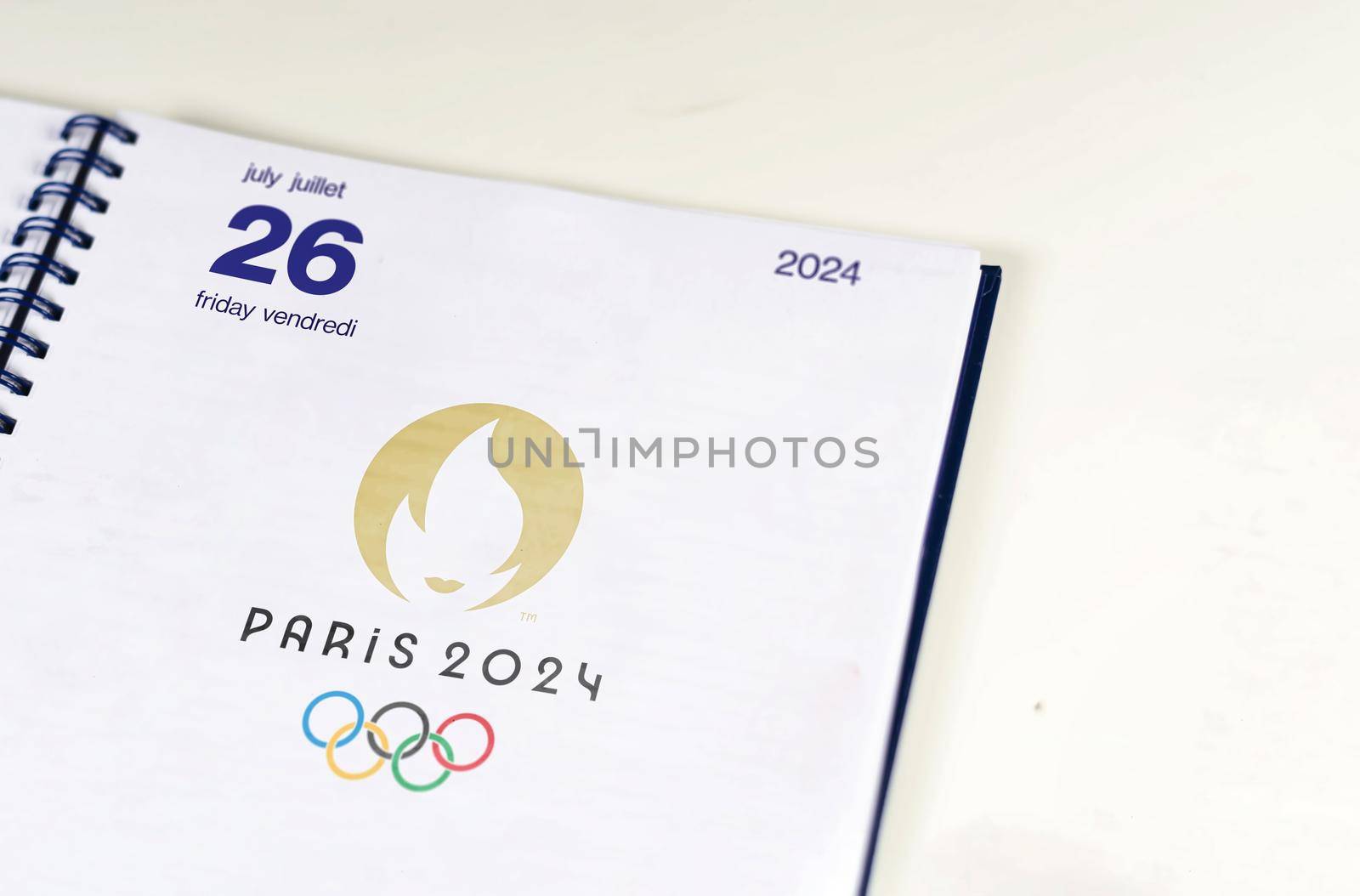 Paris, France, August 2021: An open agenda on the page of July 26, 2024, opening day of the Paris 2024 Summer Olympics. Official Paris 2024 logo. International sporting event.