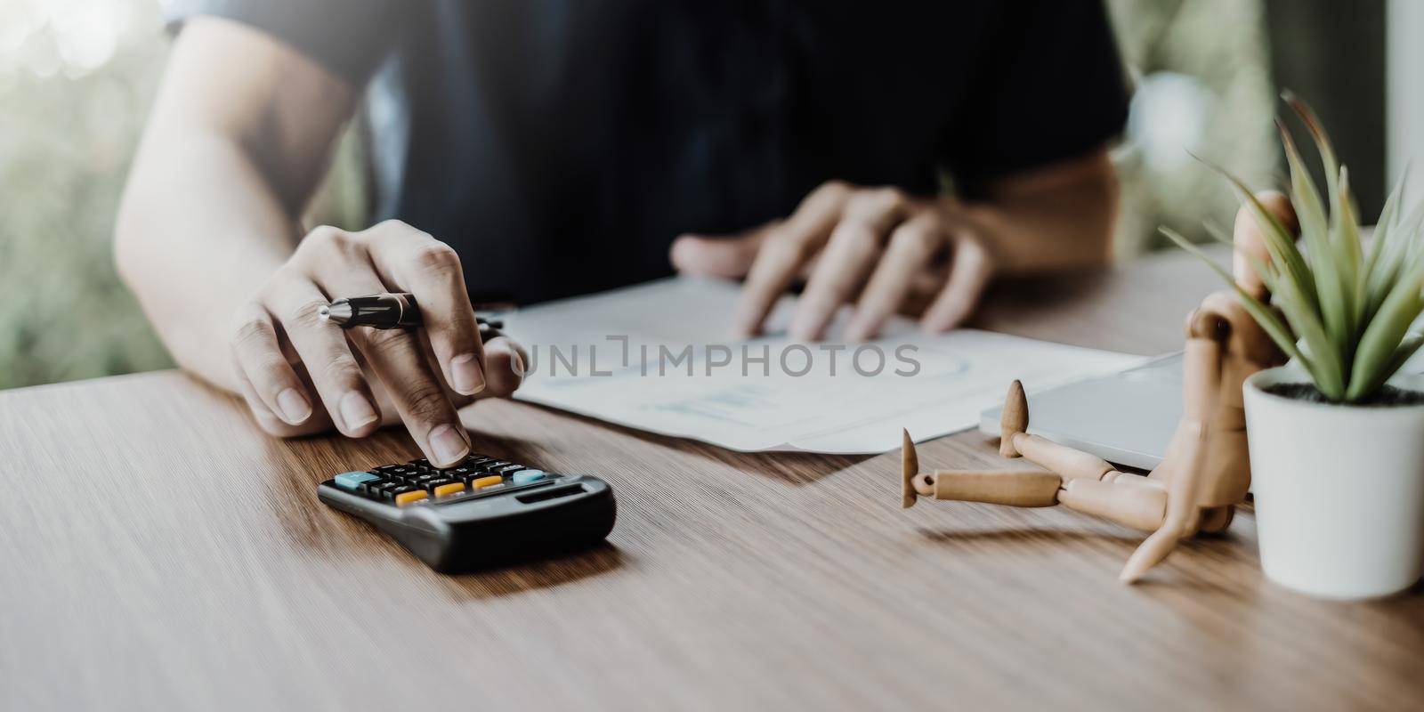 A businesswoman examines a financial chart in order to make arrangements. Investment concept for a business fund. vintage fillter by itchaznong