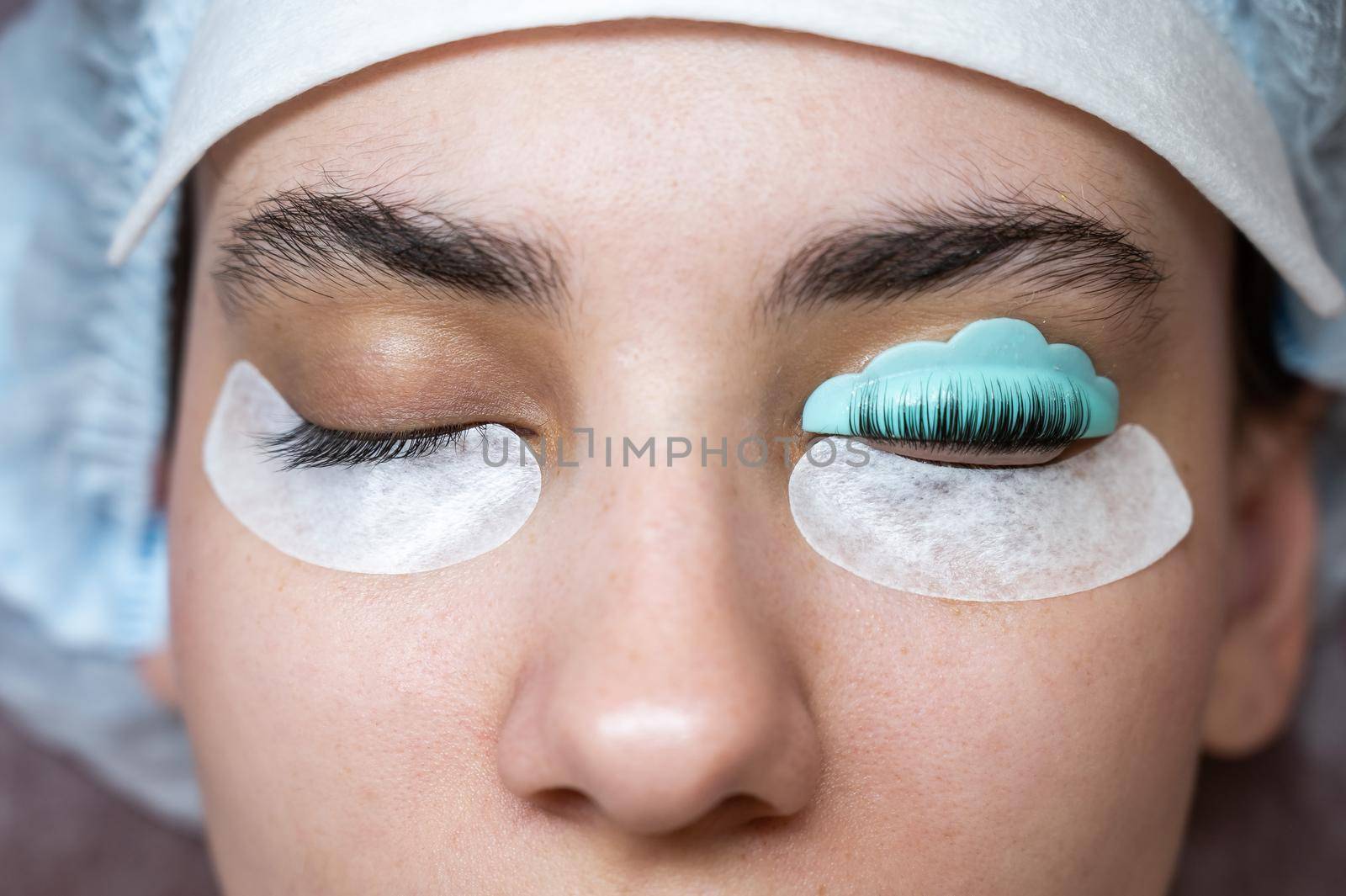 Caucasian woman on eyelash lamination procedure. Before and after. by mrwed54