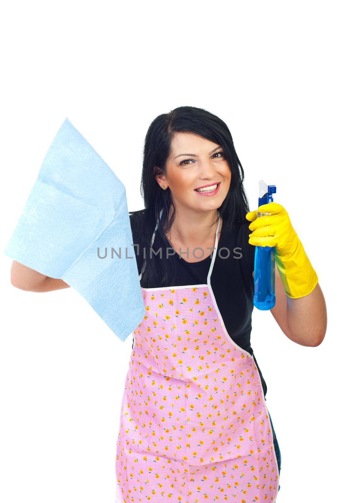 Happy brunette woman with  pink apron holding spray and duster and preparing to cleaning house isolated on white background