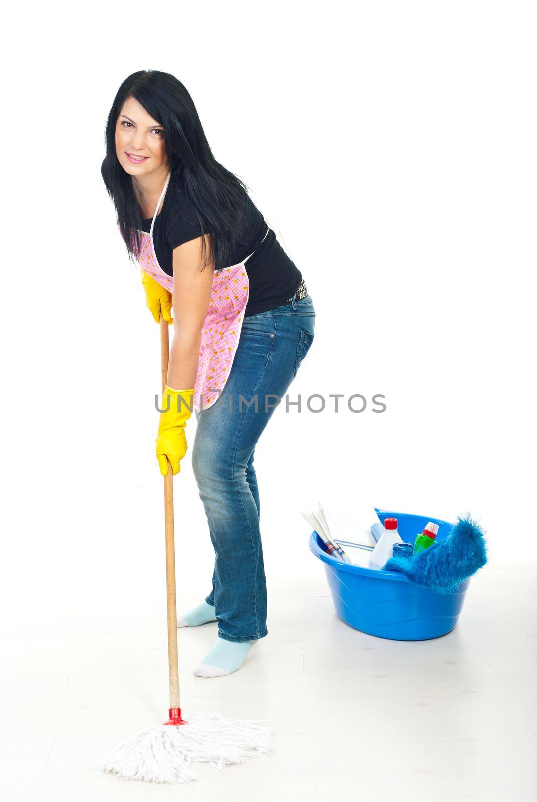 Beauty woman with pink apron washing white wooden floor with mop 