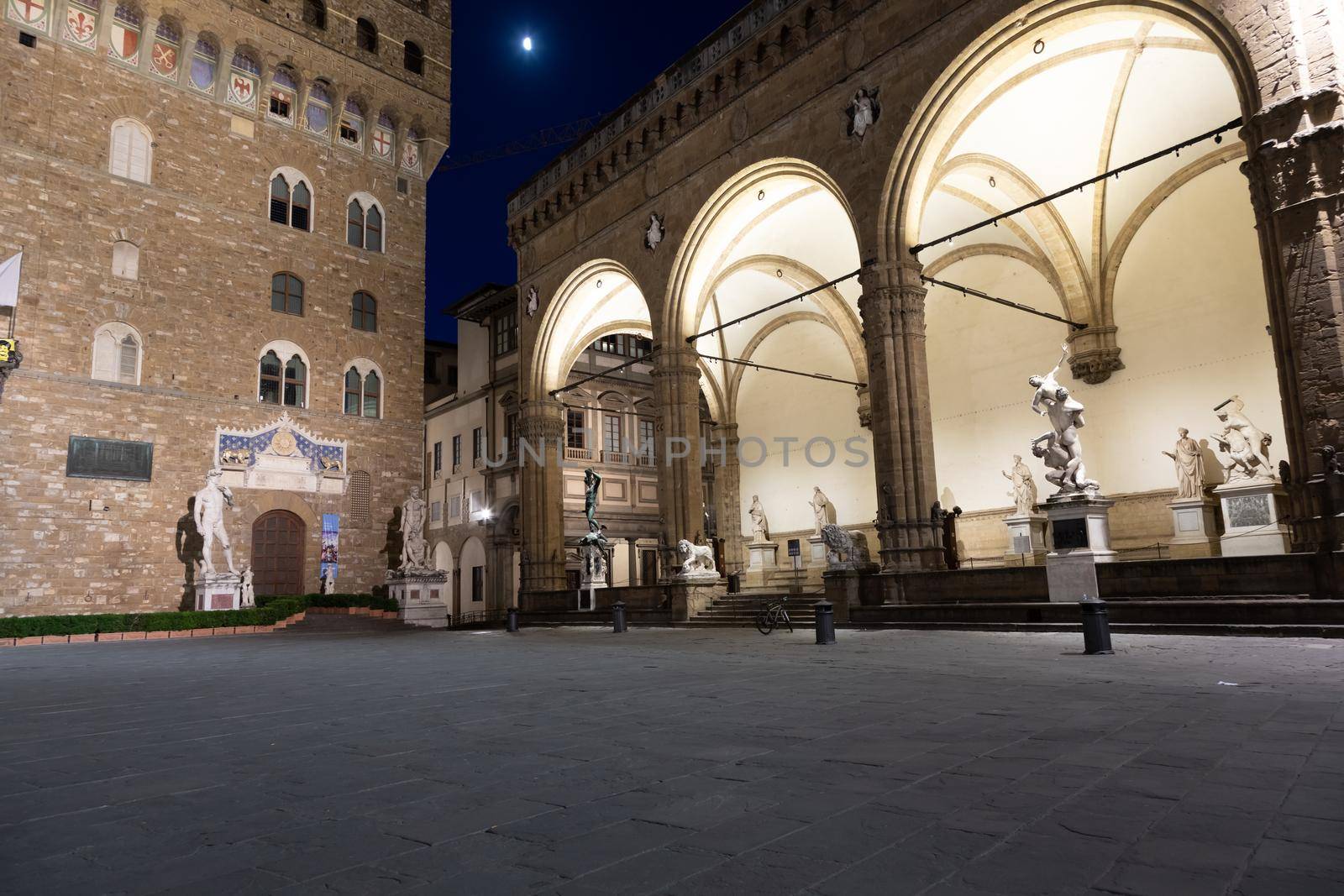 Florence, Italy - Circa June 2021:  architecture illuminated by night, Piazza della Signoria - Signoria Square. Urban scene in exterior - nobody.