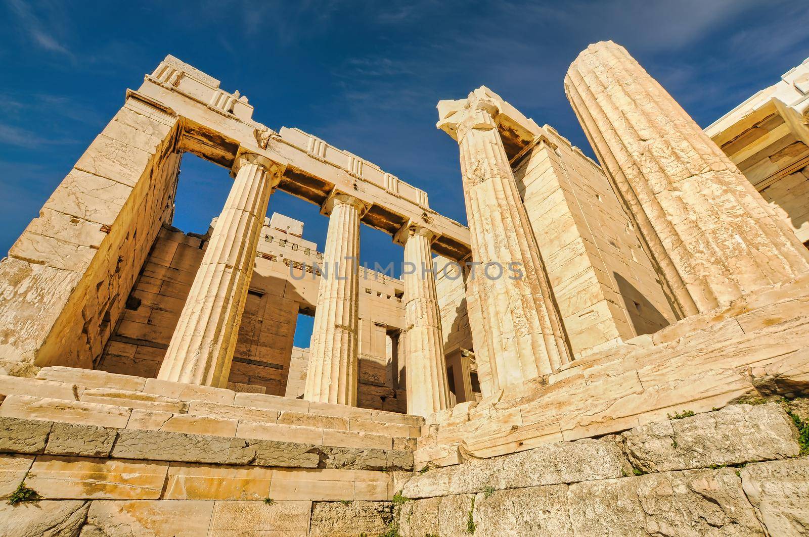 Propylaea, the entrance of the Acropolis of Athens on a Summer day. View of Propylaea at Acropolis of Athens, Greece