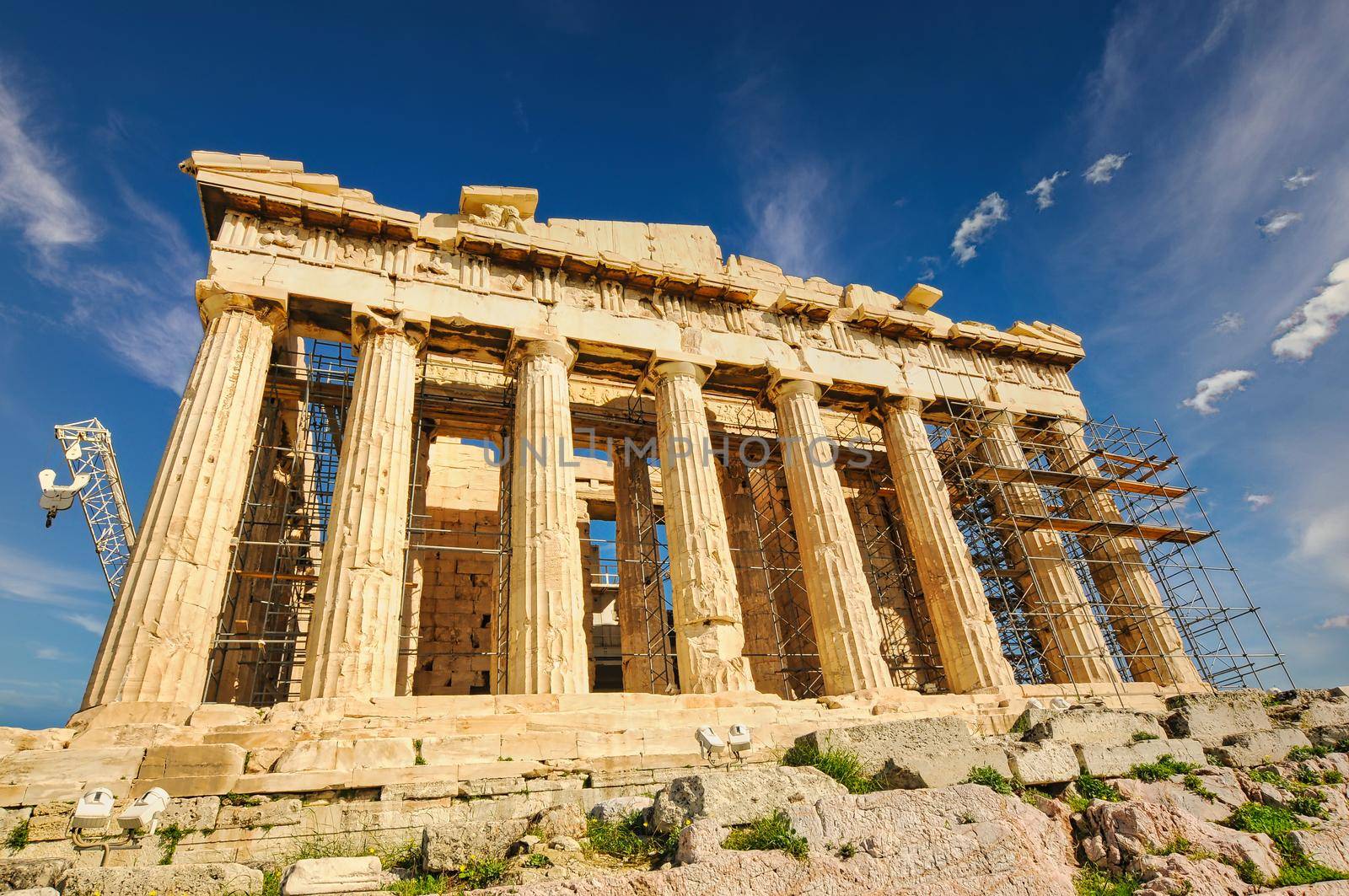 Parthenon temple on a bright day. Acropolis in Athens, Greece..