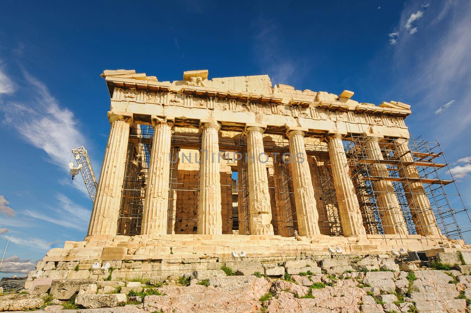 Parthenon temple on a bright day. Acropolis in Athens, Greece..