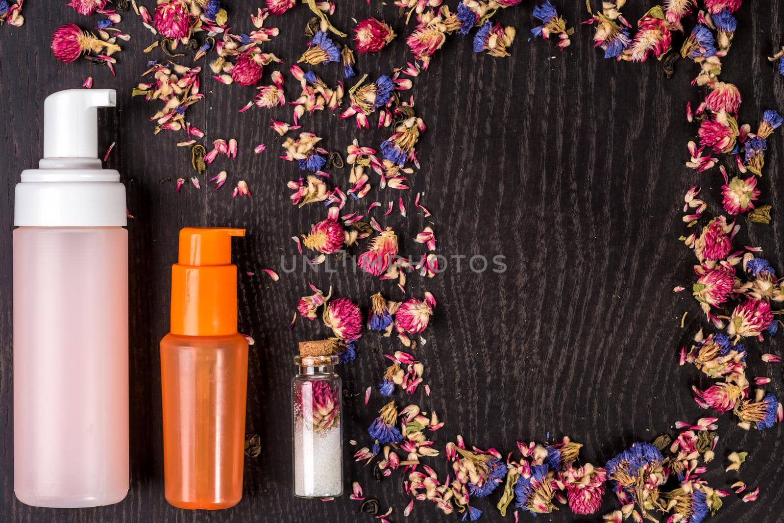 Petals, dry flowers and women's accessories. Flat lay, Top view by nazarovsergey